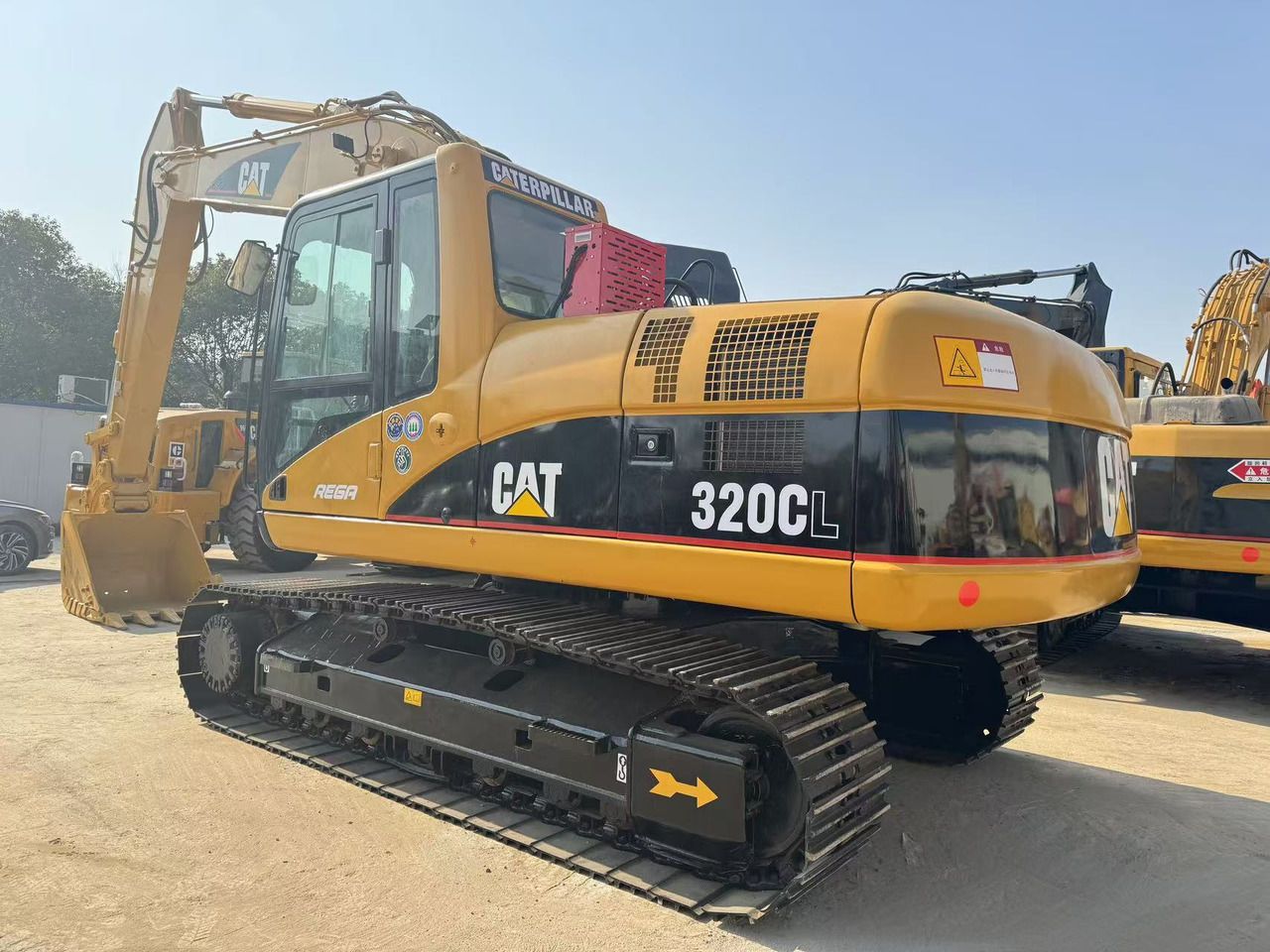 Pelle sur chenilles Caterpillar 320CL de 2019, vue arrière trois-quarts