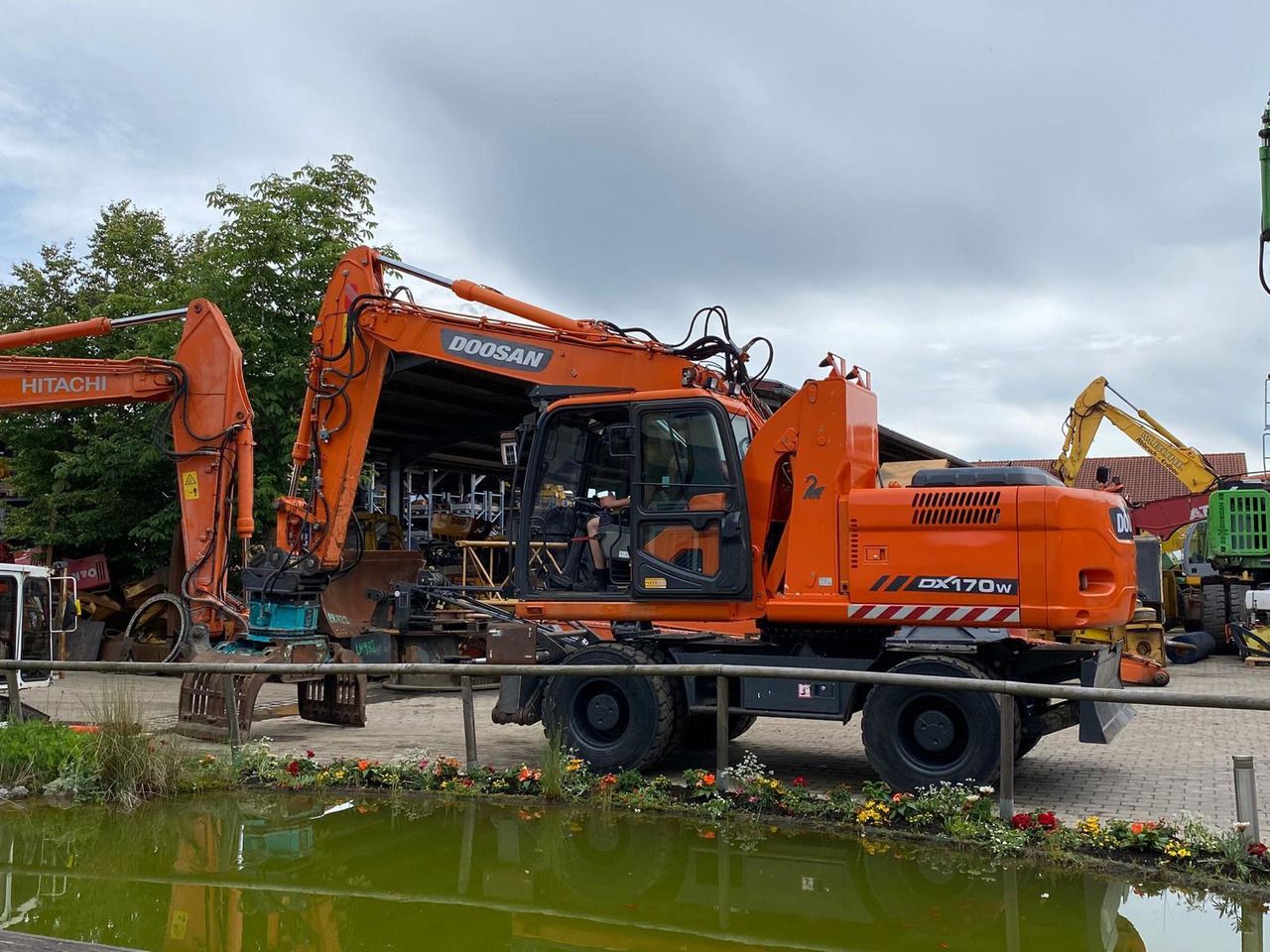 2014 Doosan DX170W wheel excavator, side view 2014 Doosan DX170W wheel excavator, side view