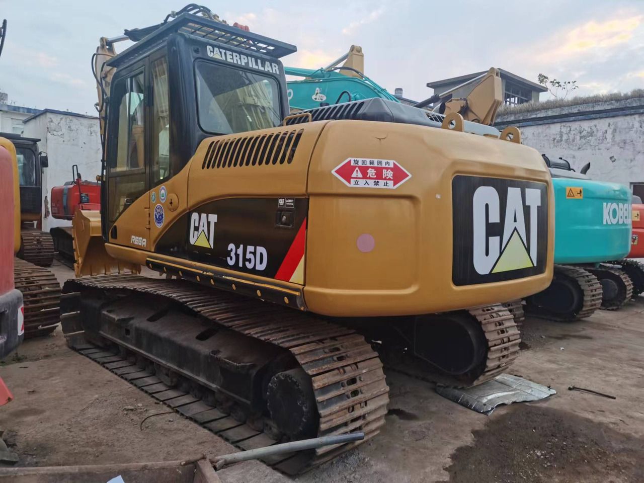 2018 Caterpillar 315D crawler excavator rear three-quarter view