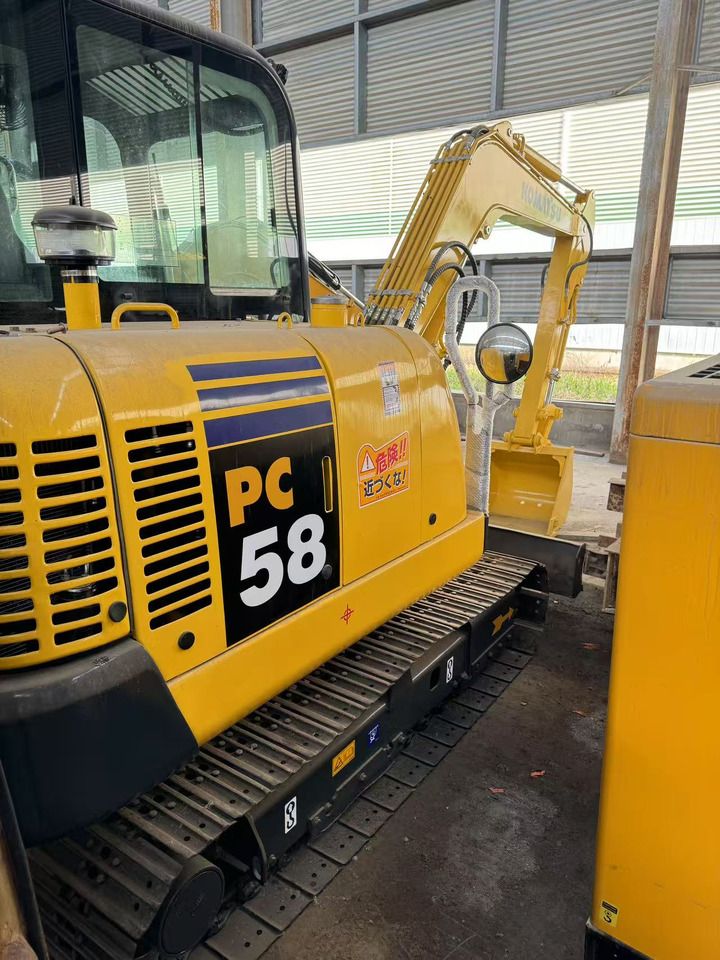 2023 Komatsu PC58 mini excavator, side view 2023 Komatsu PC58 mini excavator, side view