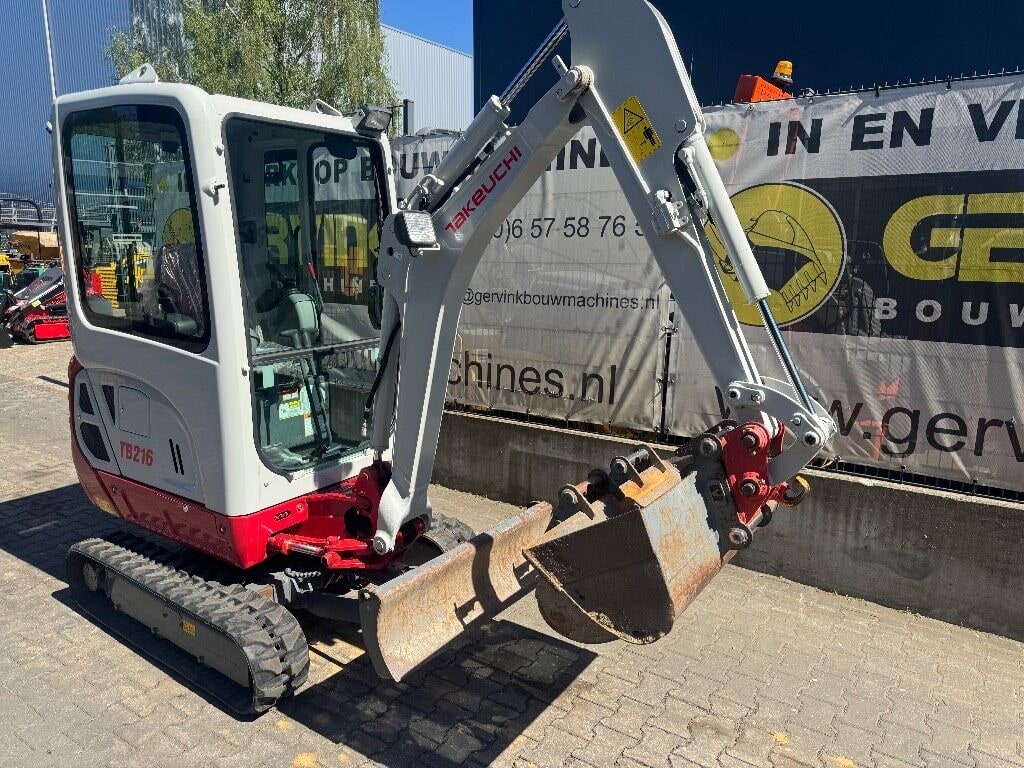 2020 Takeuchi TB216 mini excavator, side view 2020 Takeuchi TB216 mini excavator, side view
