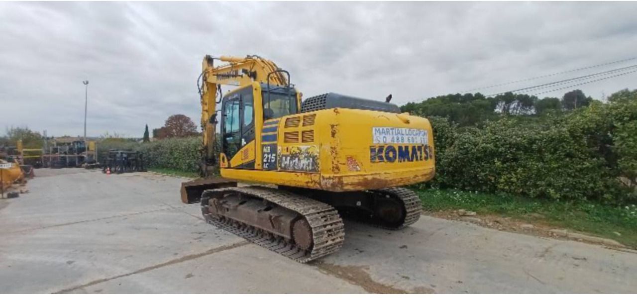 2017 Komatsu HB215LC-2 crawler excavator, rear three-quarter view 2017 Komatsu HB215LC-2 crawler excavator, rear three-quarter view