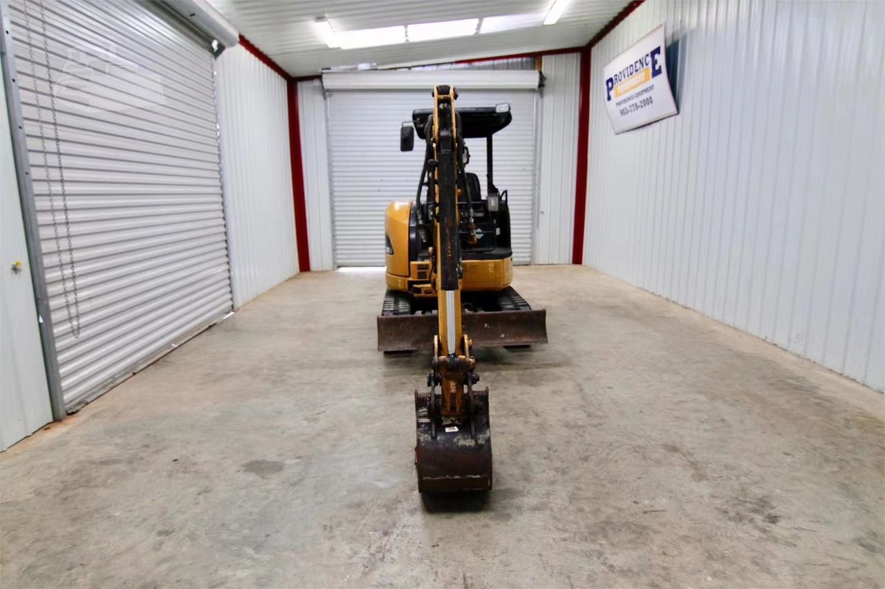 2022 Caterpillar 303C mini excavator, front view 2022 Caterpillar 303C mini excavator, front view