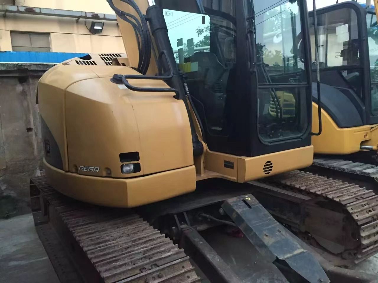2022 Caterpillar 308D excavator, rear three-quarter view