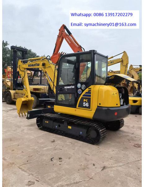 2024 Komatsu PC56 mini excavator, side profile view