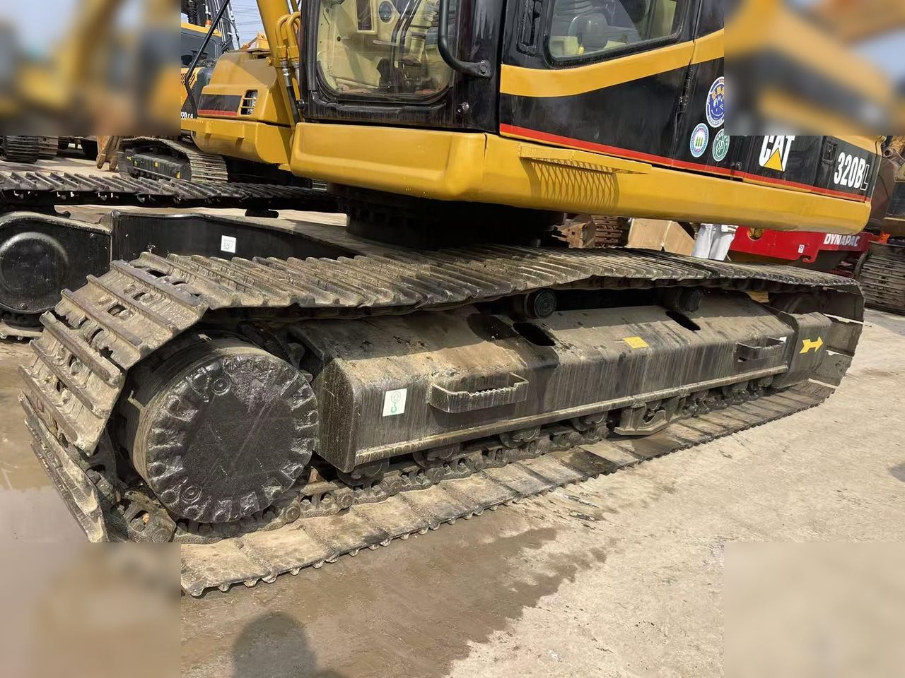 2020 Caterpillar 320BL crawler excavator side view of tracks and cab 2020 Caterpillar 320BL crawler excavator side view of tracks and cab