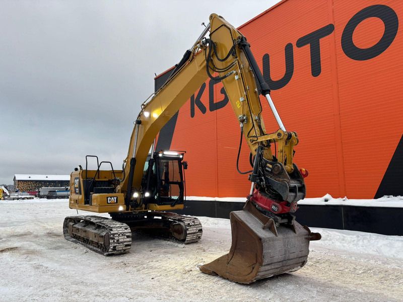 2018 Caterpillar 323 crawler excavator with tiltrotator, side view