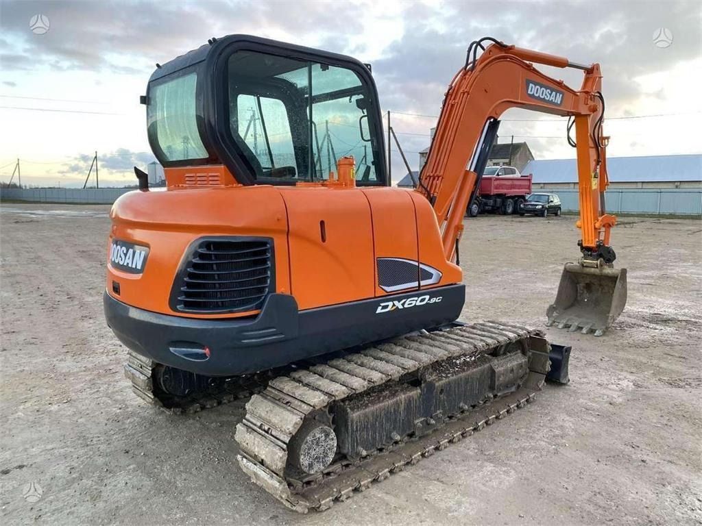 2021 Doosan DX60C mini excavator, rear three-quarter view