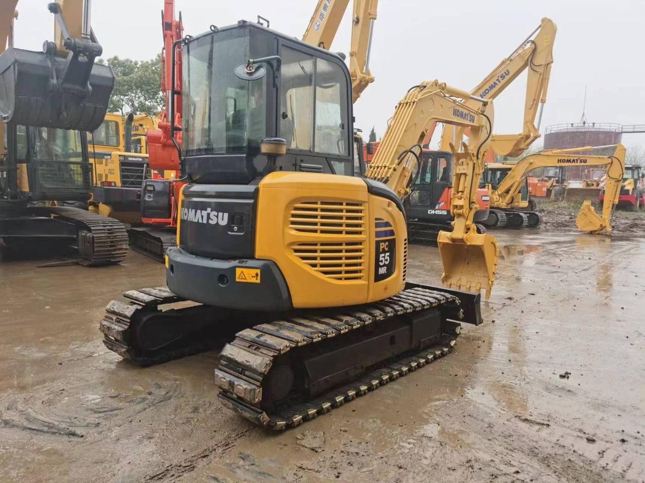2015 Komatsu PC55MR-2 mini excavator, rear three-quarter view 2015 Komatsu PC55MR-2 mini excavator, rear three-quarter view