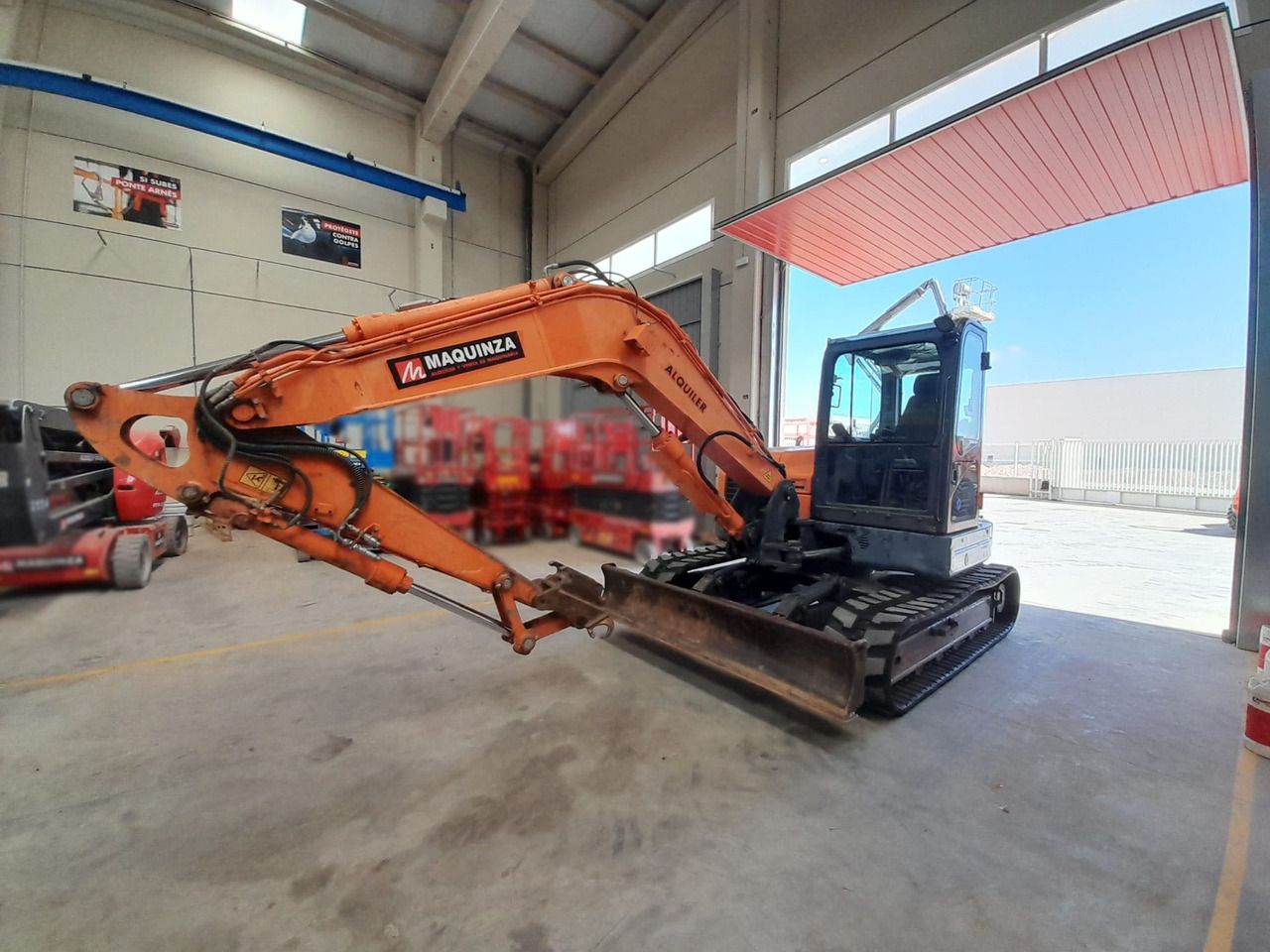 2015 Develon DX85R-7 mini excavator, side view 2015 Develon DX85R-7 mini excavator, side view