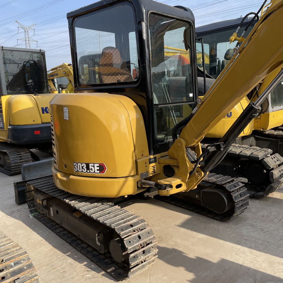 Caterpillar 303.5E mini excavator, rear three-quarter view Caterpillar 303.5E mini excavator, rear three-quarter view