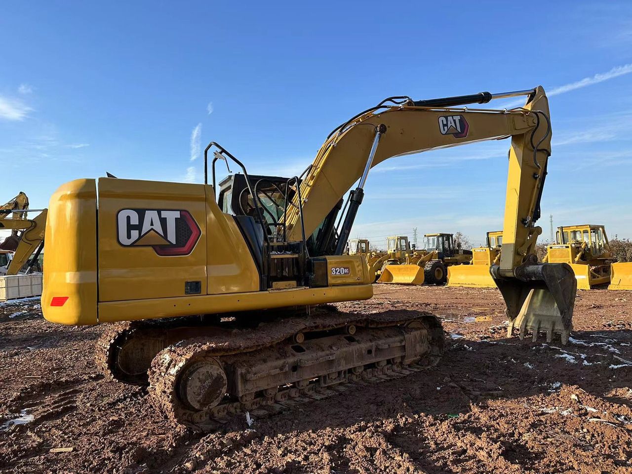 2021 Caterpillar 320GC crawler excavator, side profile view
