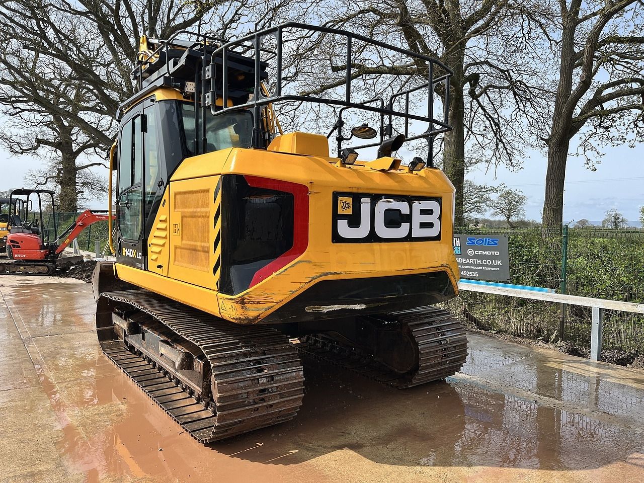2023 JCB 140X LC crawler excavator rear three-quarter view