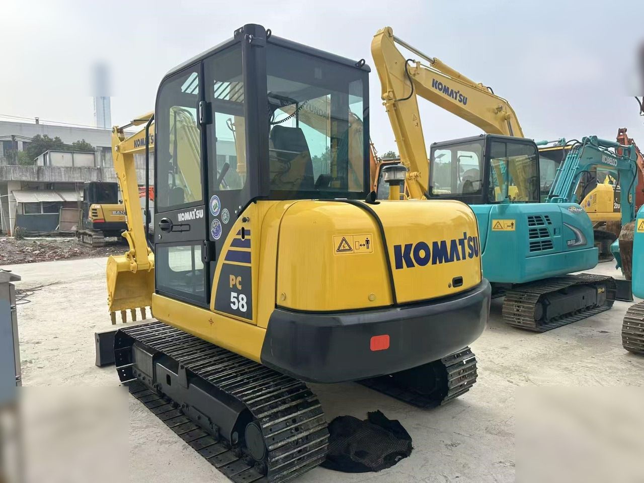 2021 Komatsu PC58 mini excavator, rear three-quarter view