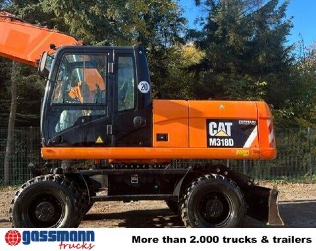 2011 Caterpillar M318D wheel excavator, side profile view 2011 Caterpillar M318D wheel excavator, side profile view