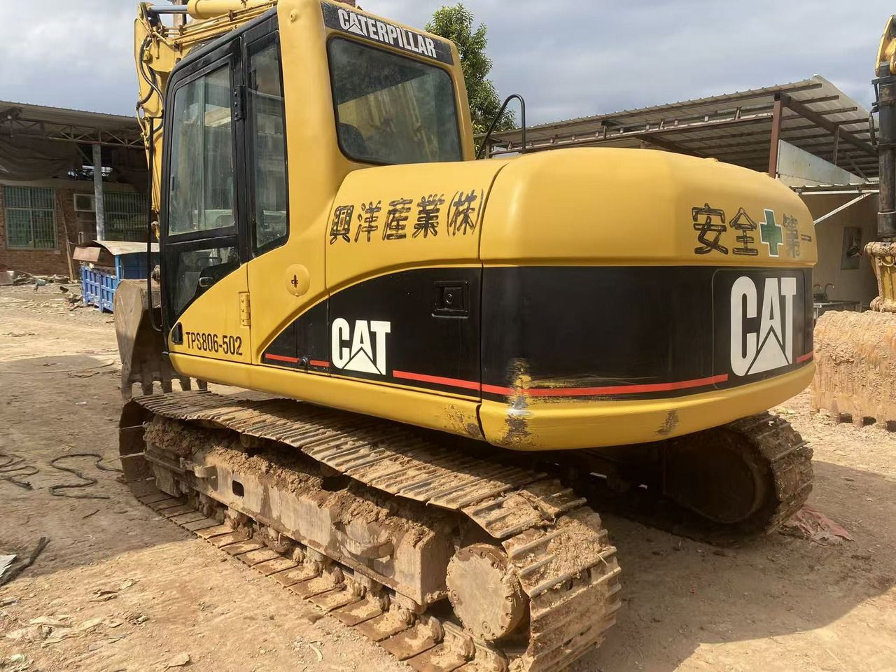 2014 Caterpillar 312C crawler excavator, rear three-quarter view 2014 Caterpillar 312C crawler excavator, rear three-quarter view