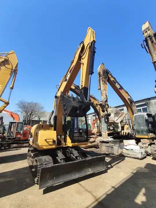 2016 Caterpillar 312C crawler excavator, rear three-quarter view 2016 Caterpillar 312C crawler excavator, rear three-quarter view
