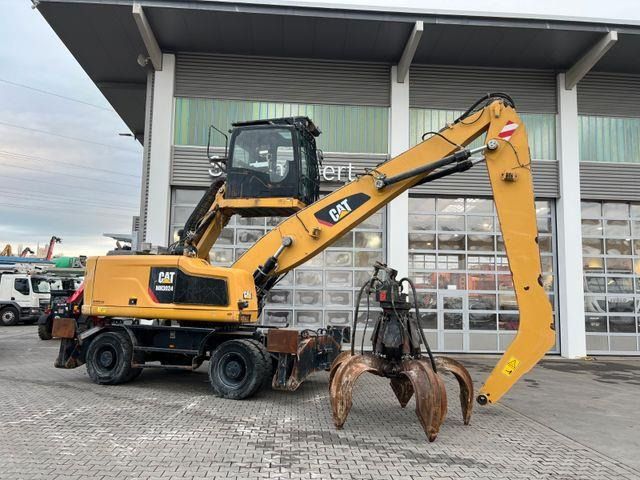 2018 Caterpillar MH3024 material handler side view