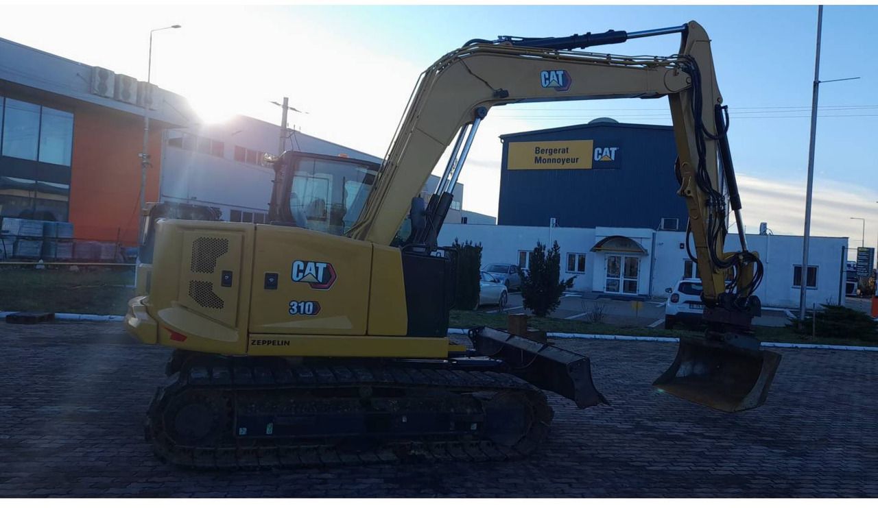 2021 Caterpillar 310-07 crawler excavator, side view 2021 Caterpillar 310-07 crawler excavator, side view