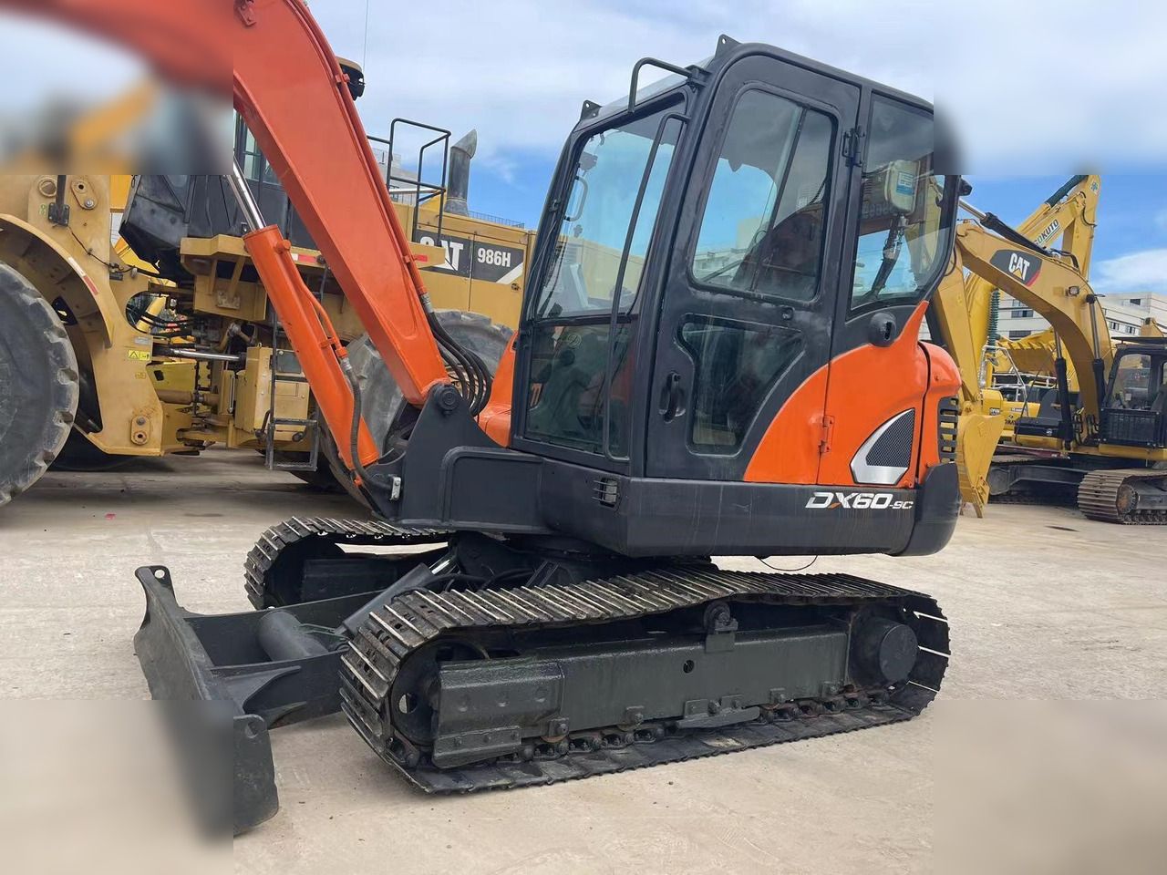 2021 Doosan DX60-9C crawler excavator, side view 2021 Doosan DX60-9C crawler excavator, side view