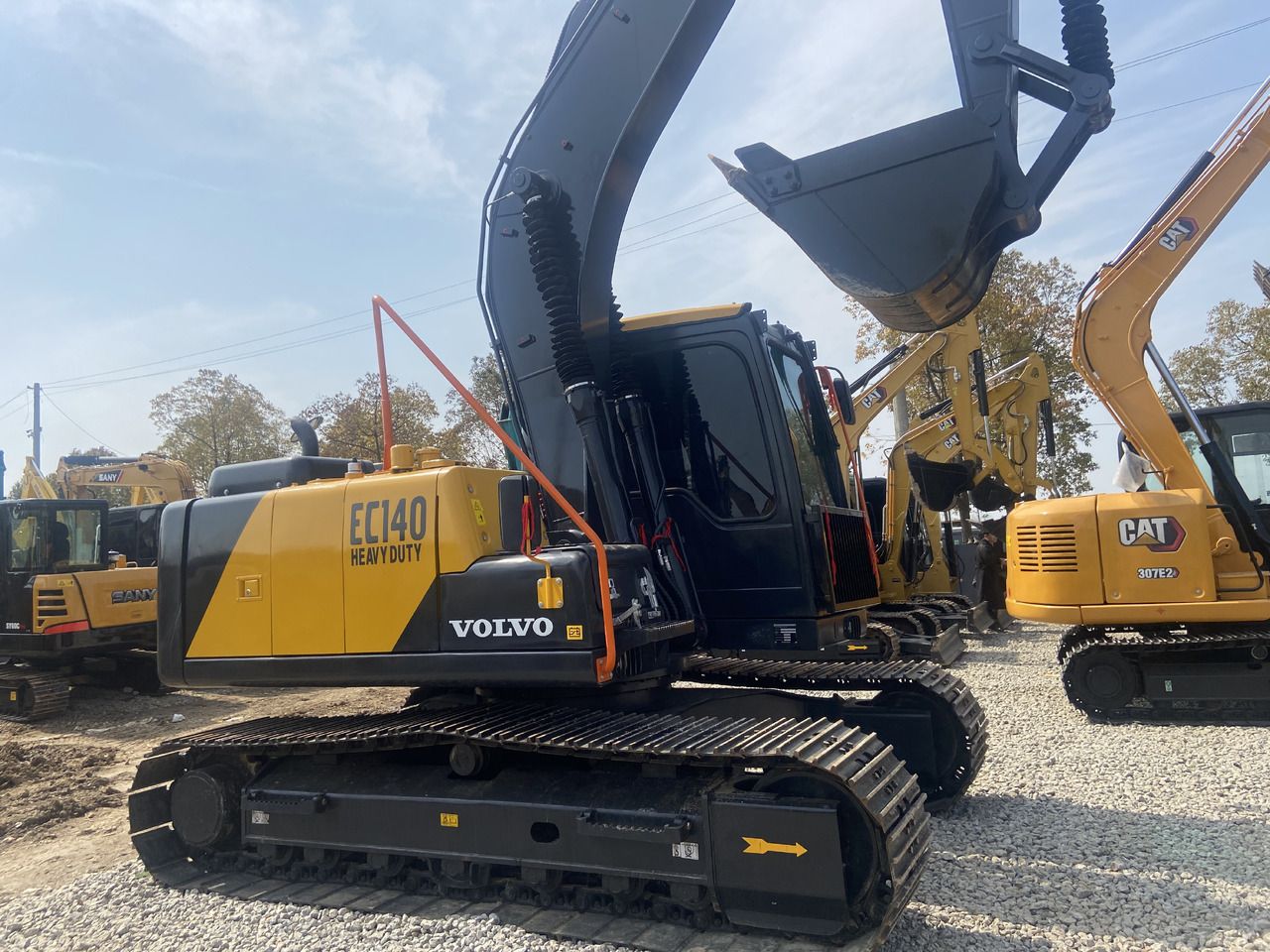 2022 Volvo EC140 crawler excavator, side view 2022 Volvo EC140 crawler excavator, side view