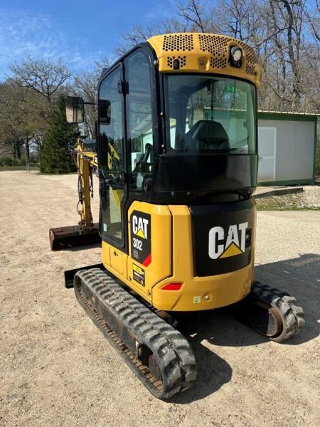 2019 Caterpillar 302 NG mini excavator, rear three-quarter view 2019 Caterpillar 302 NG mini excavator, rear three-quarter view