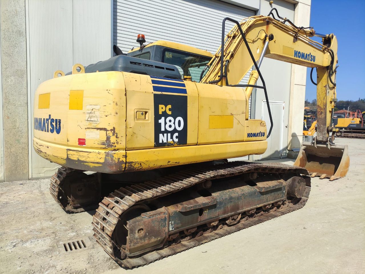 2006 Komatsu PC180NLC-7K crawler excavator, rear three-quarter view