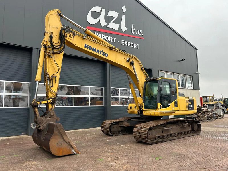 2011 Komatsu PC240LC-8 crawler excavator, side view 2011 Komatsu PC240LC-8 crawler excavator, side view