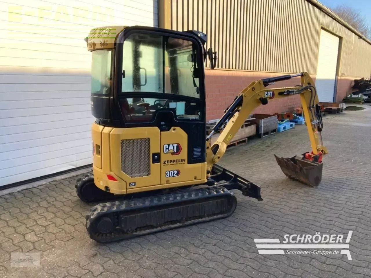 2021 Caterpillar 302CR mini excavator, rear three-quarter view 2021 Caterpillar 302CR mini excavator, rear three-quarter view
