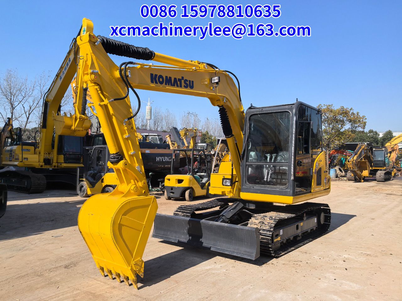 2024 Komatsu PC70 crawler excavator, front three-quarter view