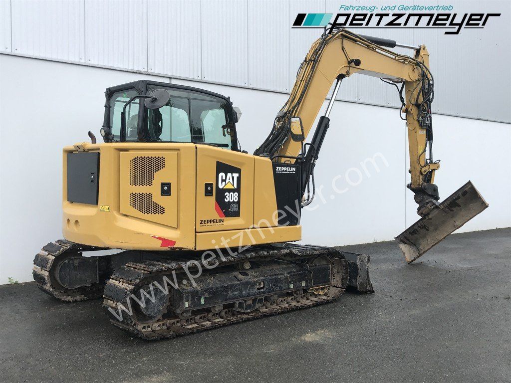 2019 Caterpillar 308 CR mini excavator, rear three-quarter view 2019 Caterpillar 308 CR mini excavator, rear three-quarter view