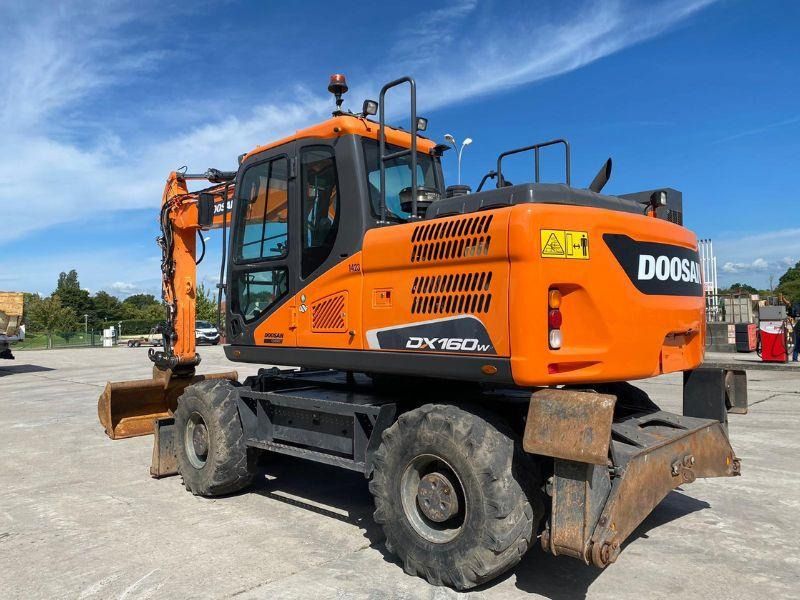 2021 Doosan DX160W wheel excavator, rear three-quarter view