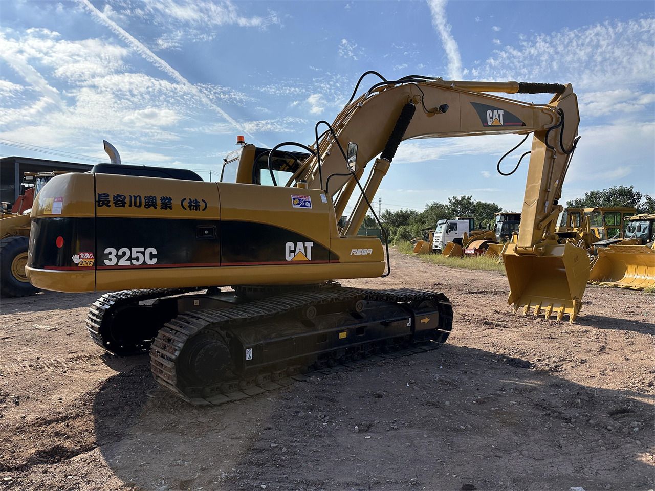 2018 Caterpillar 325C crawler excavator, rear three-quarter view