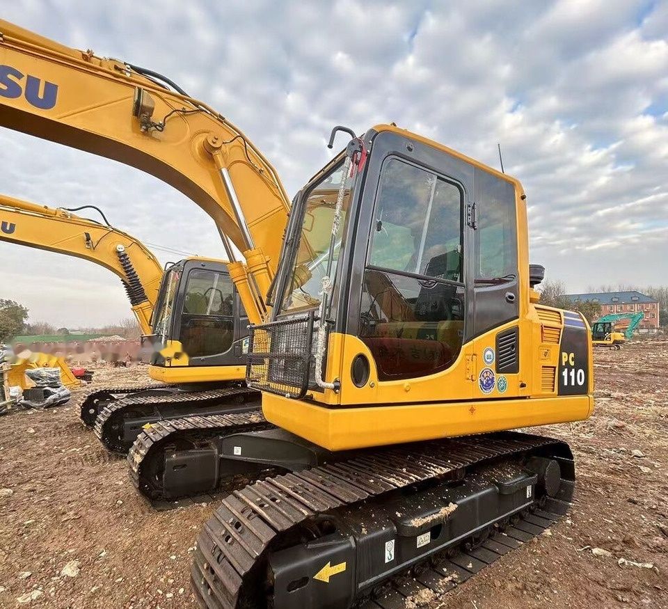 Komatsu PC110 crawler excavator, side view