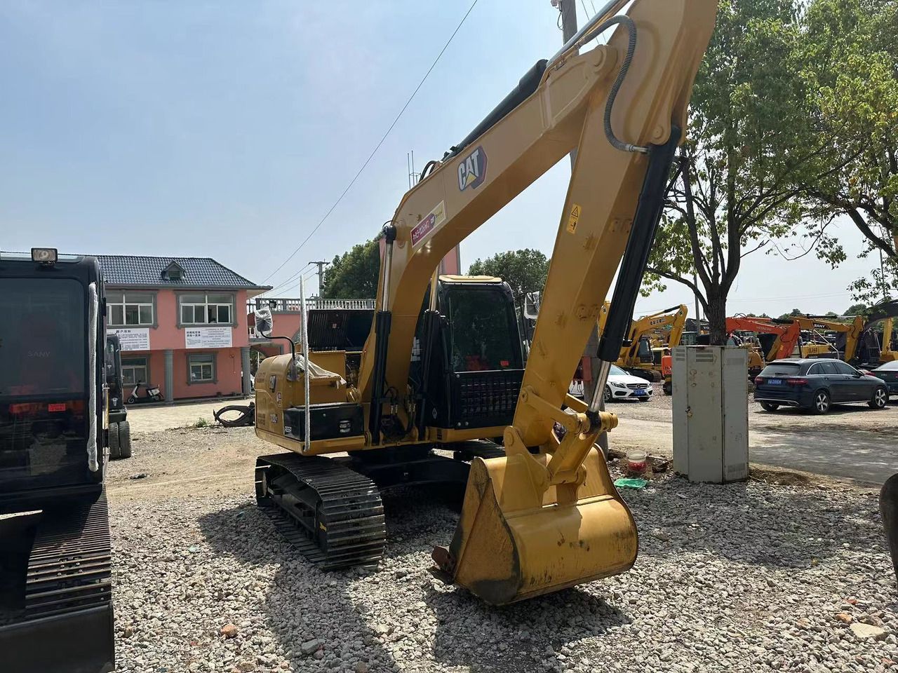2021 Caterpillar 312D excavator, front three-quarter view 2021 Caterpillar 312D excavator, front three-quarter view