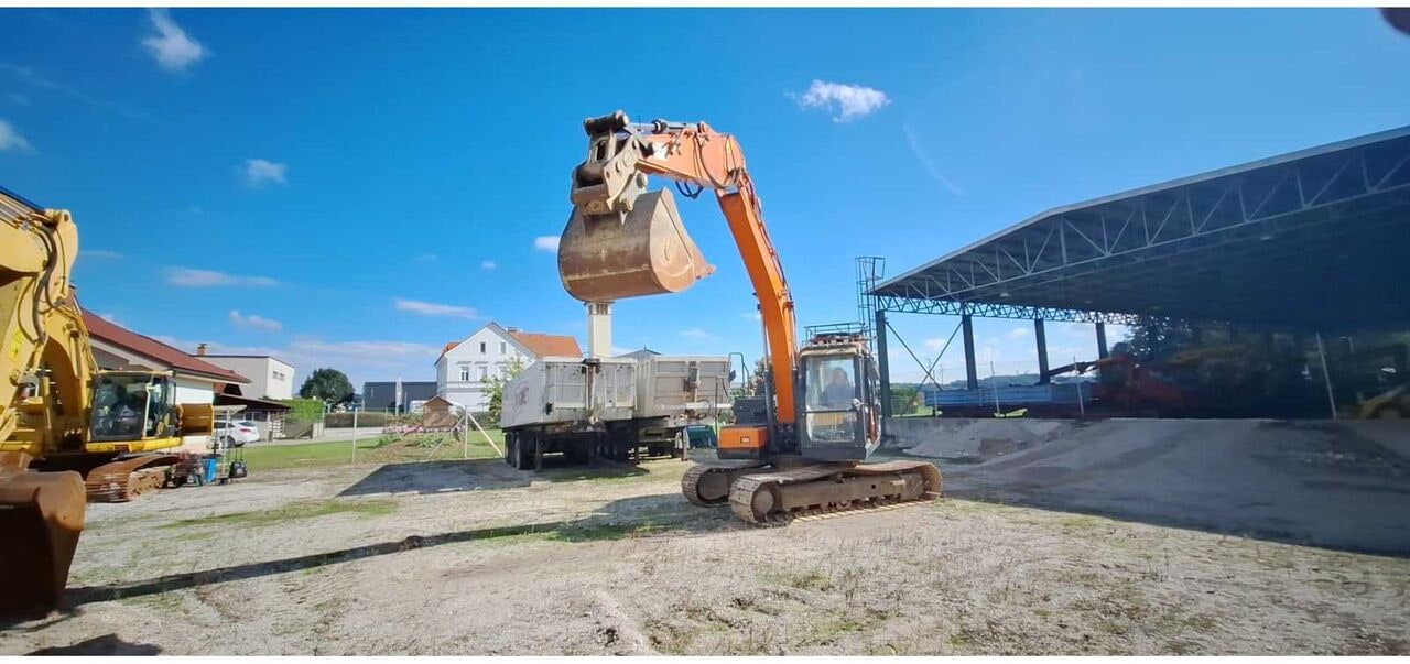Doosan DX140LC-5 crawler excavator, front three-quarter view
