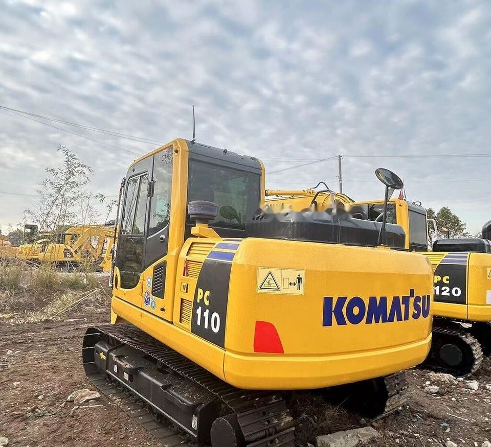 Komatsu PC110 crawler excavator, rear three-quarter view