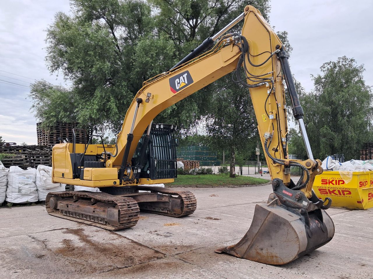 2018 Caterpillar 323GC crawler excavator, side view