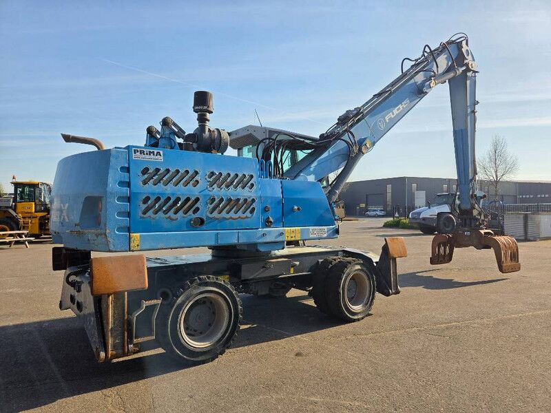 2016 Fuchs MHL331 material handler, rear three-quarter view