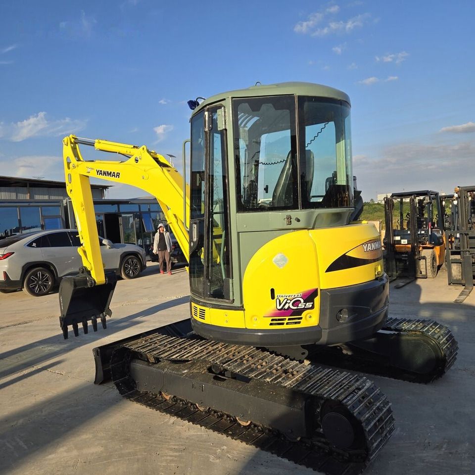 2022 Yanmar VIO55 mini excavator, rear three-quarter view 2022 Yanmar VIO55 mini excavator, rear three-quarter view