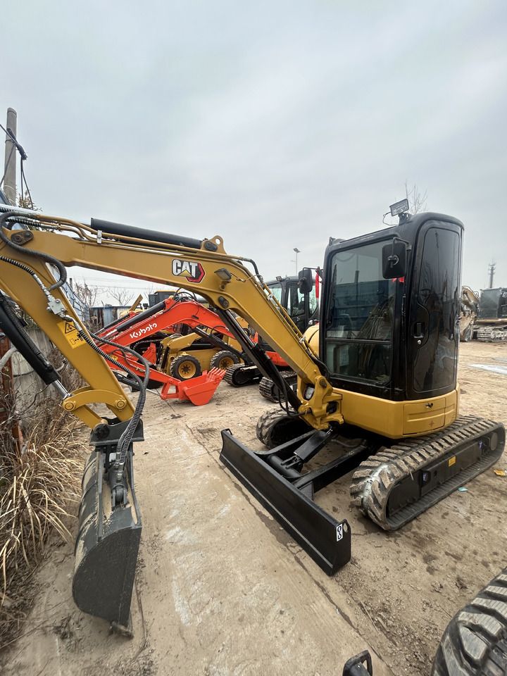 2024 Caterpillar 303.5ECR mini excavator, front three-quarter view 2024 Caterpillar 303.5ECR mini excavator, front three-quarter view