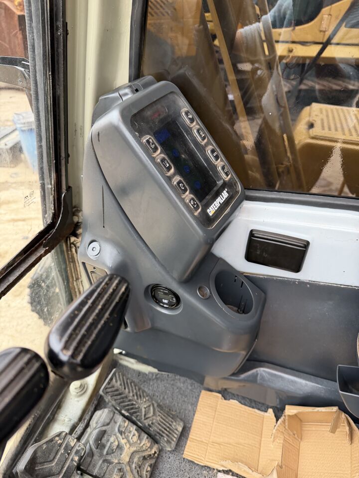 2024 Caterpillar 320BL crawler excavator interior cabin control panel
