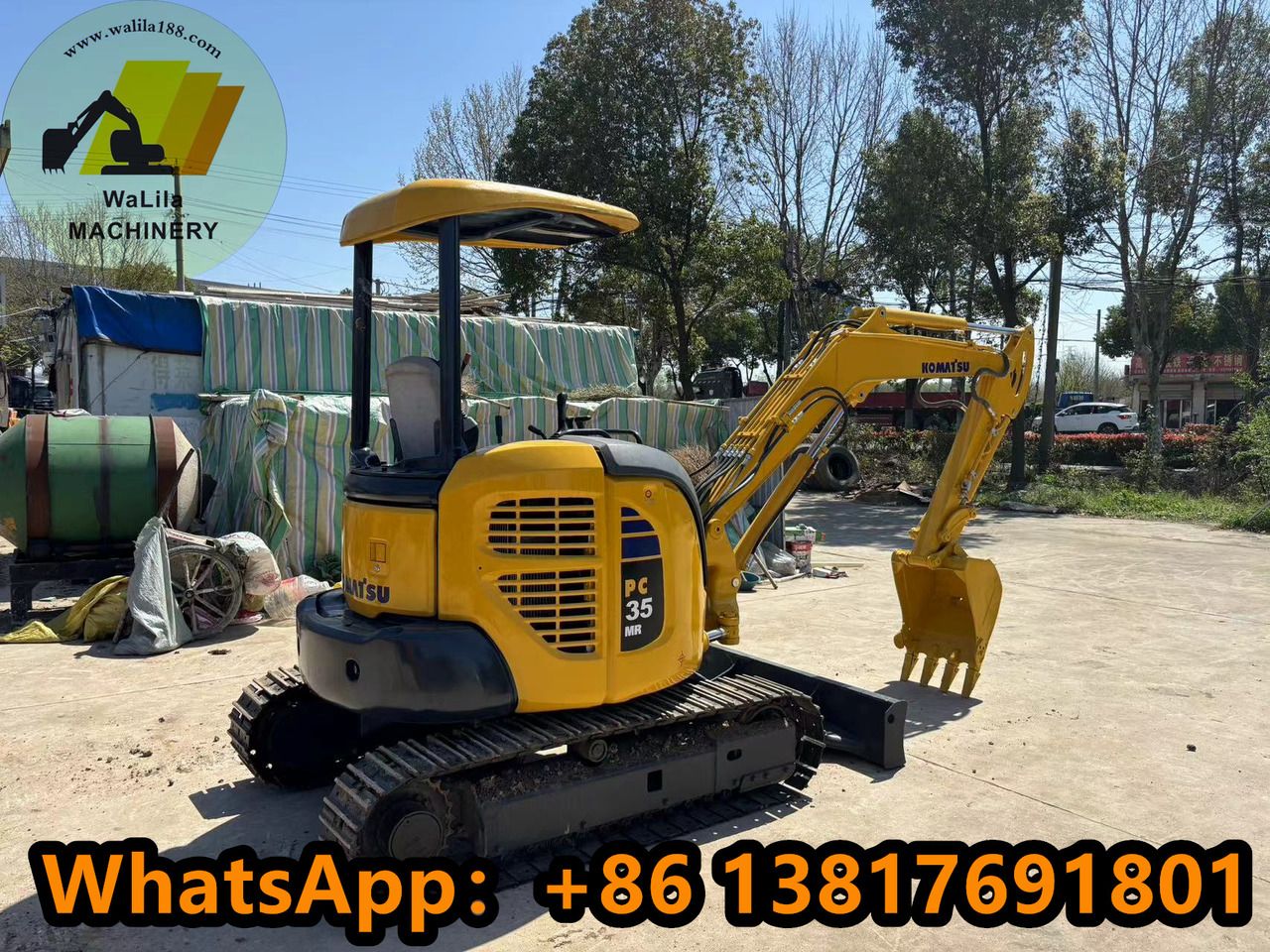 2023 Komatsu PC35MR mini excavator, rear three-quarter view 2023 Komatsu PC35MR mini excavator, rear three-quarter view