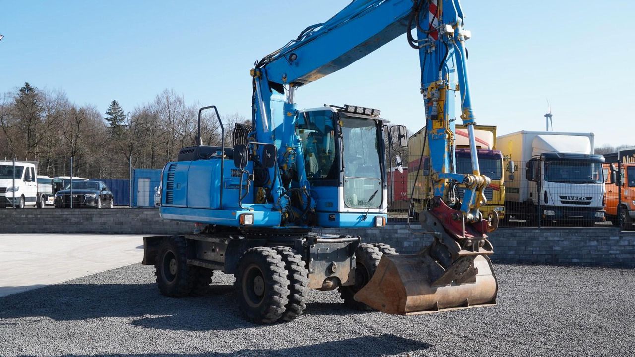 2013 Komatsu PW160-8 wheel excavator, front three-quarter view 2013 Komatsu PW160-8 wheel excavator, front three-quarter view