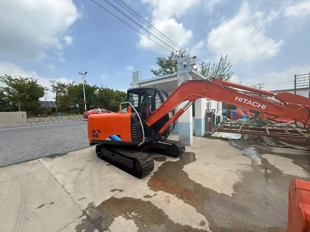 2025 Hitachi Zaxis 60 mini excavator, rear three-quarter view