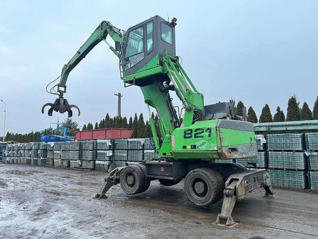 2010 Sennebogen 821 material handler, rear three-quarter view 2010 Sennebogen 821 material handler, rear three-quarter view