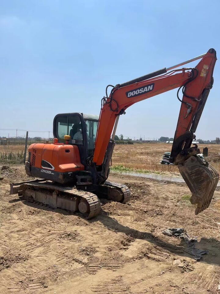 2023 Doosan DX55-9C mini excavator side view 2023 Doosan DX55-9C mini excavator side view