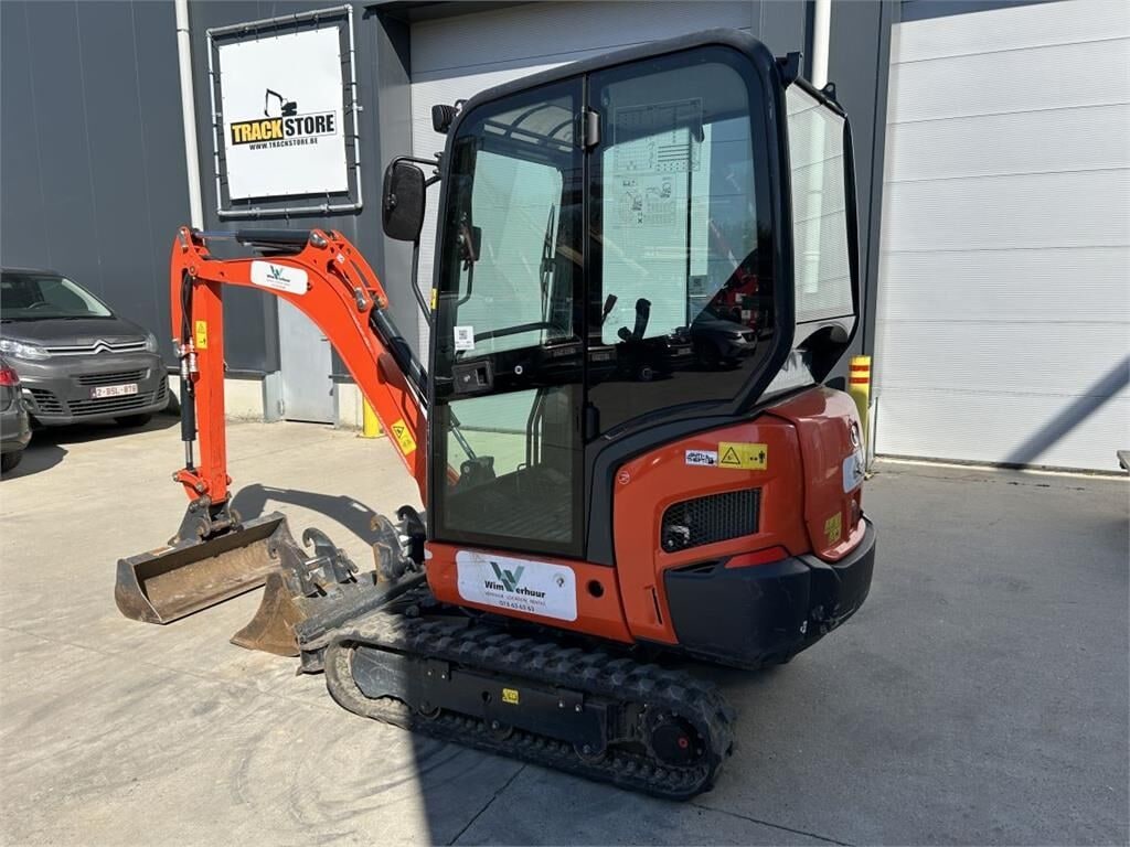 2024 Kubota KX019-4 mini excavator, rear three-quarter view