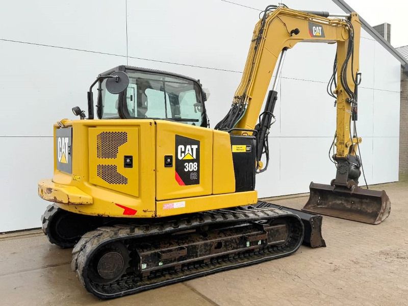 2019 Caterpillar 308CR mini excavator, rear three-quarter view 2019 Caterpillar 308CR mini excavator, rear three-quarter view