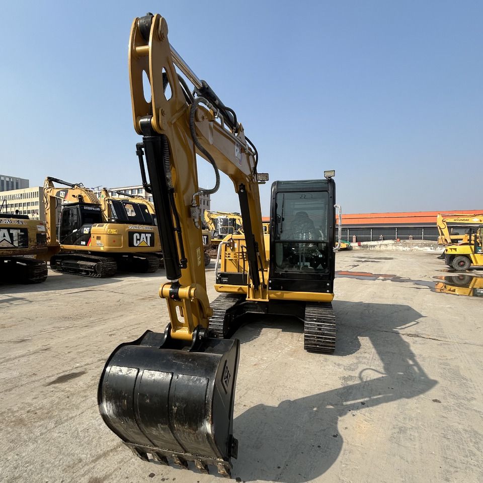 2023 Caterpillar 305.5E2 mini excavator, front view